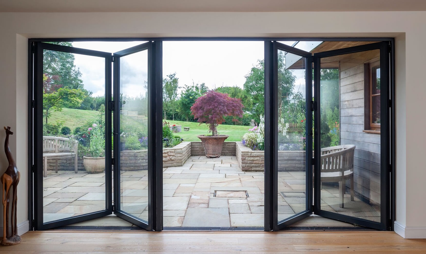 Looking through bi-fold doors to the garden